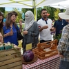 Students shop for fresh veggies and honey harvested on campus while visiting PCC's Portlandia Farmstandia.