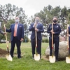 From left, Fullerton Mayor Bruce Whitaker, CSUF President Framroze Virjee, Mayor Pro Tem Nick Dunlap, CalFire Regional Urban Forester Lynnette Short and Fullerton Council Member Fred Jung pose for a photograph during an Arbor Day celebration at Cal State Fullerton.