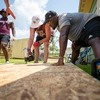 Texas A&M Student Athletes volunteering at Habitat for Humanity