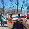 Students preparing the mulch for the pollinator garden