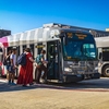 Passengers boarding Campus Shuttle at the Loops