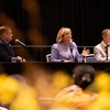 Cody Tubbs, Southern California Edison director of public affairs, left, with County Board of Supervisors members Katrina Foley and Vicente Sarmiento