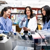 06/02/2021 - Boston, Mass. - Dr. Maribel Rios, Professor of Neuroscience , poses for a photo in her lab with Stella Xiyun Chen, doctoral candidate in Neuroscience, and Alice Meng, doctoral candidate in Cellular, Molecular and Developmental Biology, on June 2, 2021. (Alonso Nichols/Tufts University)