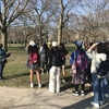 Recent Northwestern alum, Maggie Olson, leads a bird watching walk as part of Earth Month celebrations at Northwestern.