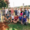 Furman students help commorate our Tree Campus USA designation by planting a tree