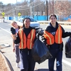 University of Connecticut students collaborate with town residents to pick up litter around the Storrs campus twice a year.