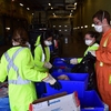 Amanda Evans (second on right), Sustainability Scholar 2016 sorting residential food-related waste.